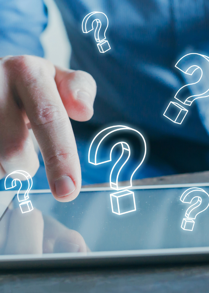 Questionmarks rising from a keyboard